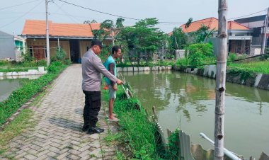 Bhabinkamtibmas-dan-Bumdes-Bangsri-Dukung-Ketahanan-Pangan-Lewat-Budidaya-Ikan-Patin-dan-Nila